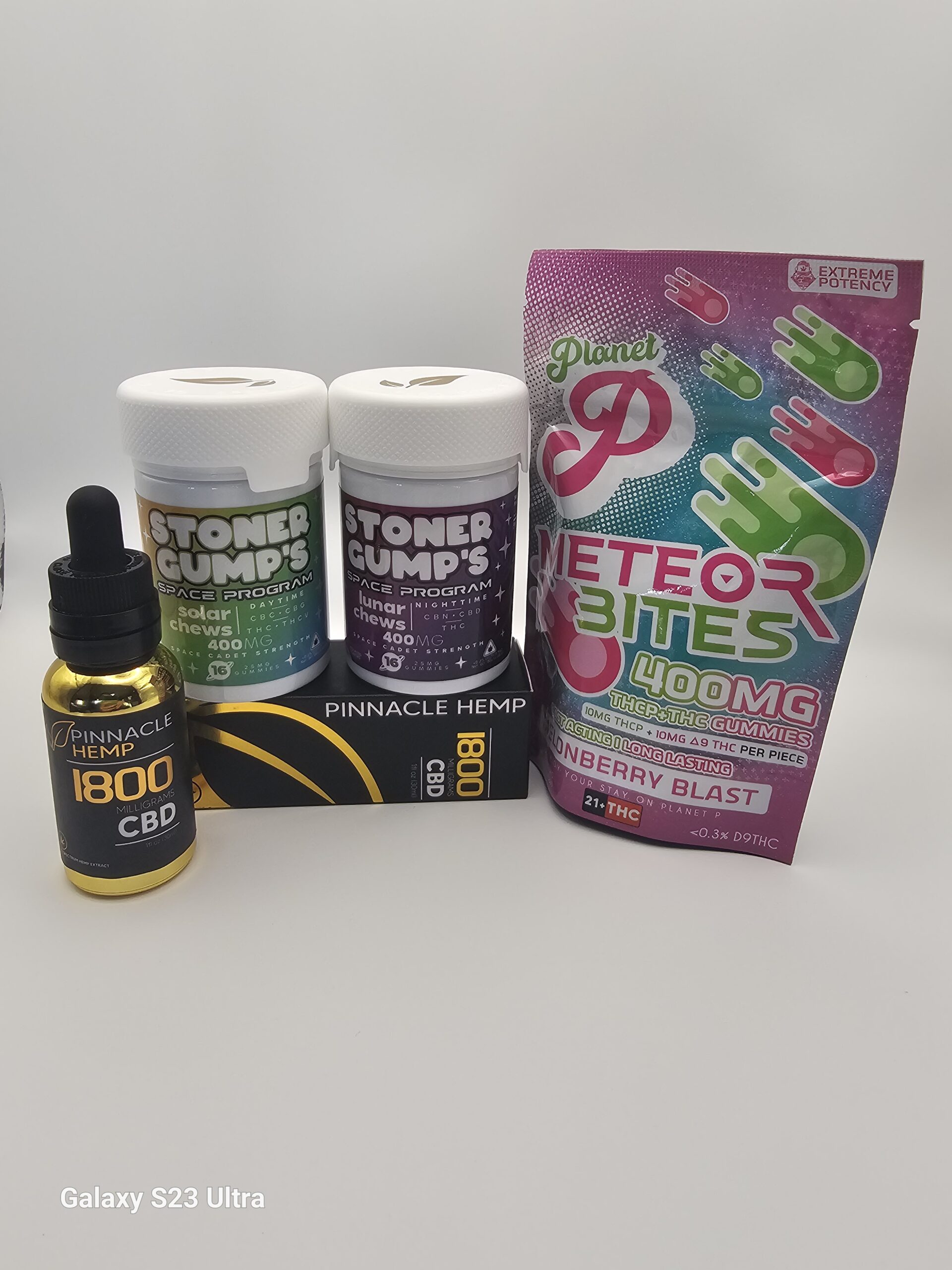 Pinnacle Hemp 1800mg full spectrum CBD tincture bottle standing next