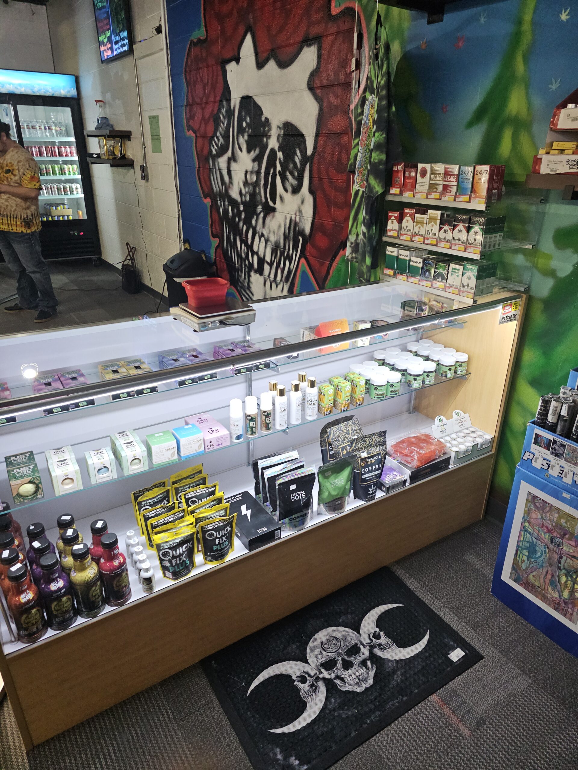 Product display wall at Grateful Headz Springfield grand opening